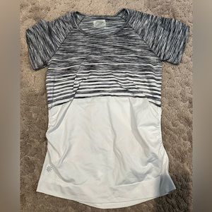 Women’s size medium Athleta nylon/spandex short sleeve shirt. Black, grey, white